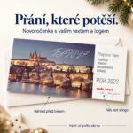 Sváteční Pražský hrad s Karlovým mostem v popředí – novoročenka s nabídkou vlastního textu a loga.